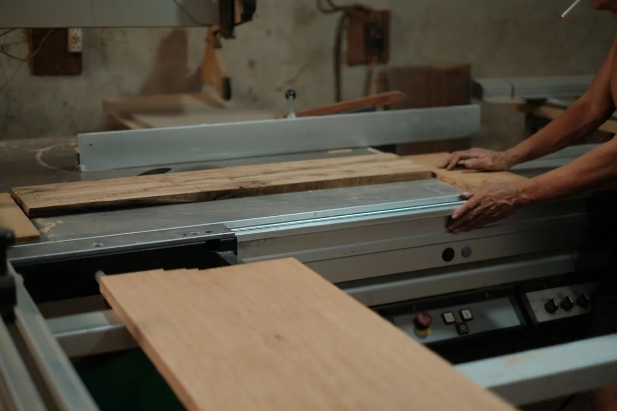 Oak boards stacked in a joinery workshop